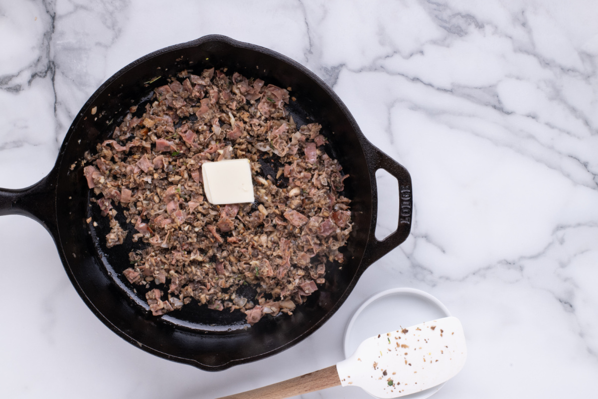 Add cream to mushroom pan